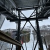 The view up the hill from the cable car terminus at the base, featuring the red carriage that would take us up.