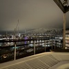 Beautiful view from the jacuzzi in the hotel, over the harbour towards the distant mountains.